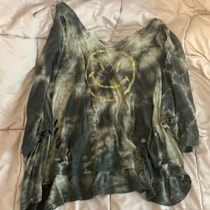 Distressed green tie dye top with smiley print
